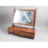 A 19th century mahogany and ebony line inlaid toilet mirror, on bowfront base, fitted two drawers,