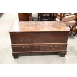 An early 18th century oak mule chest, fitted two drawers, on ogee bracket supports, 40" wide x 19