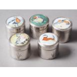 Five silver pill boxes with enamelled bird and engraved decoration, 1 1/8" dia x 1 1/8" high