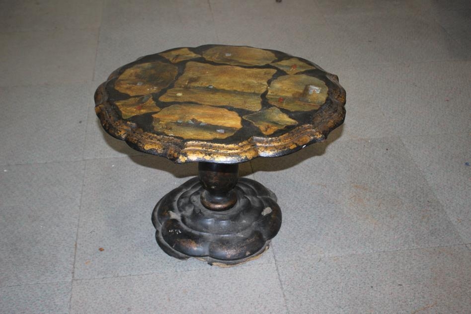 A 19th century papier-mache mother-of-pearl inlaid shaped tilt top occasional table with landscape