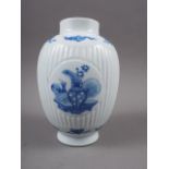 A Chinese export blue and white fluted jar, decorated panels with precious objects, 6" high
