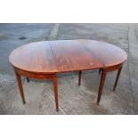 A 19th century mahogany and satinwood banded box and ebony strung dining table with centre leaf,