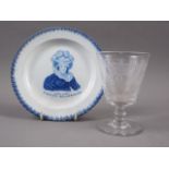 An early 19th century blue and white decorated plate, "Long live Caroline Queen of England", 7 1/