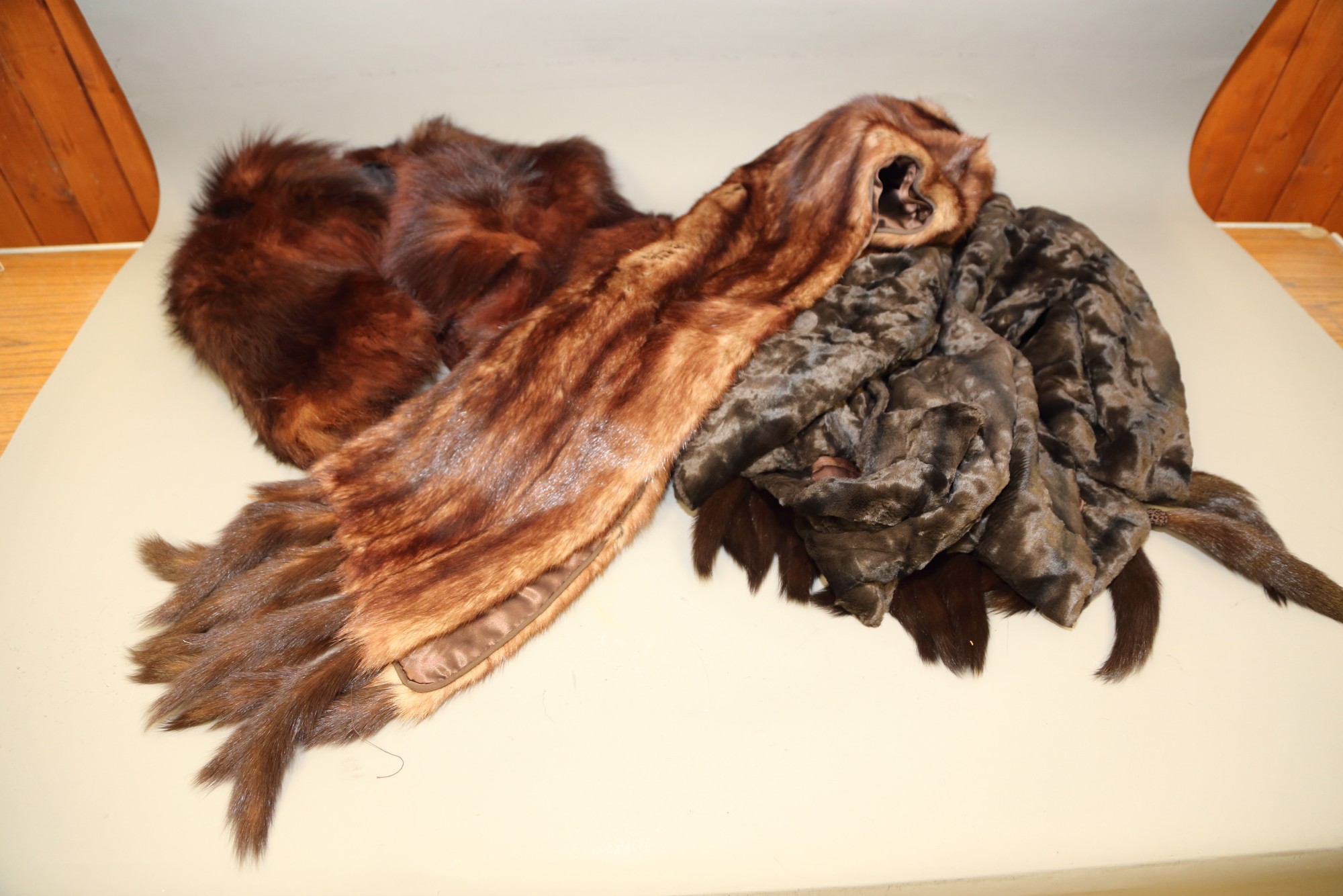 An Astrakhan fur coat, another fur coat and three fur stoles - Image 4 of 4