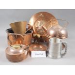 Two copper kettles, two copper wall panels, a copper oil lamp and other metal wares