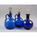 A Bristol blue glass decanter and stopper, 9 1/2" high, a similar bottle and mother-of-pearl