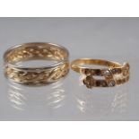 A 9ct two-colour gold ring with pierced decoration, size Y, 3.8g, and an 18ct gold ring, lacking