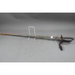 A Victorian rapier with metal scabbard, 39 1/2" long overall (fixed in rusted scabbard)