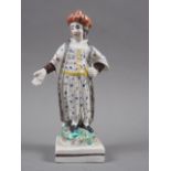 An early 19th century Staffordshire polychrome decorated figure of a Turk, on square base, 6 1/4"