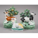 A pair of early 19th century Staffordshire bocage deer, buck 5" high, (restorations) and a smaller