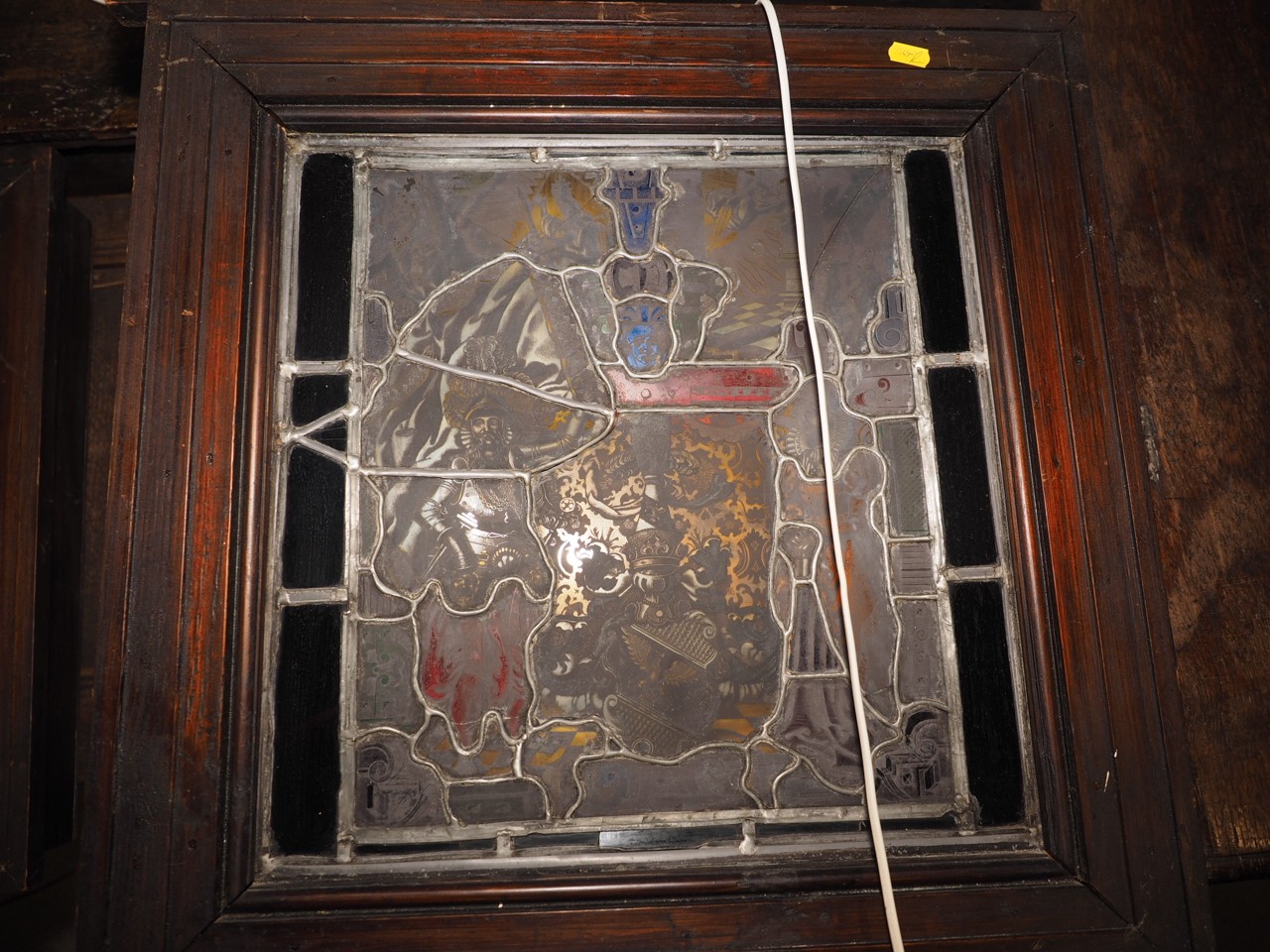 An early 20th century back lit stained glass Flight into Egypt  and a leaded window, !6th coat of