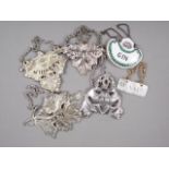 A Victorian silver vine leaf ""Sherry" decanter label, three silver plated decanter labels, a