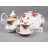 A Royal Albert Old Country Roses pattern part teaset (teapot has restored spout)