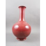 A Chinese sang de boeuf baluster vase with seal mark to base, 14 1/2" high (stapled)