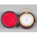 A compensated pocket barometer with silvered dial, in fitted Morocco leather case