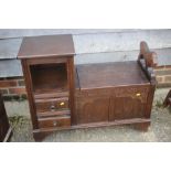 An oak telephone seat, fitted two drawers, 36" wide x 14" deep x 28 1/2" high