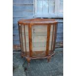 A 1930s walnut shape front display cabinet enclosed one door, on cabriole supports, 40" wide x 13
