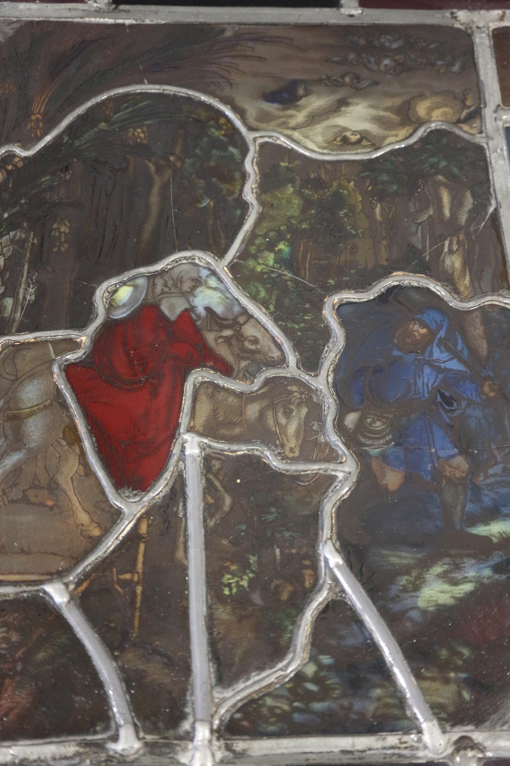 An early 20th century back lit stained glass Flight into Egypt  and a leaded window, !6th coat of - Image 3 of 5