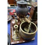 A copper warming pan with turned wood handle, a copper kettle, a copper water jug, a pair of brass