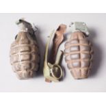 Two inert "pineapple" grenades and two "handles" (WWII French?)