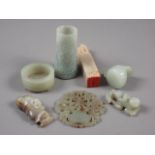 A Chinese pale jade roundel with pierced and engraved decoration, 2 1/4" dia, a hardstone seal, a