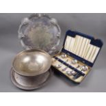 A silver plated tray, 16 1/4" dia, another similar, a plated bowl and six soup spoons, in matched