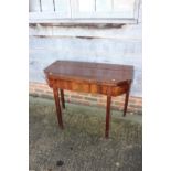 A 19th century mahogany, ebony strung and satinwood banded fold-over top tea table, on reeded