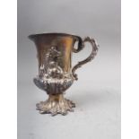 A Georgian silver pedestal mug with embossed decoration, 4" high, 4.8oz troy approx