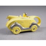 A Sadler style teapot, formed as a car, 9 3/4" long