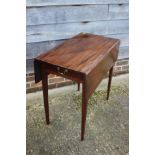 A 19th century mahogany Pembroke table, fitted one drawer, on square taper supports, 32" wide x