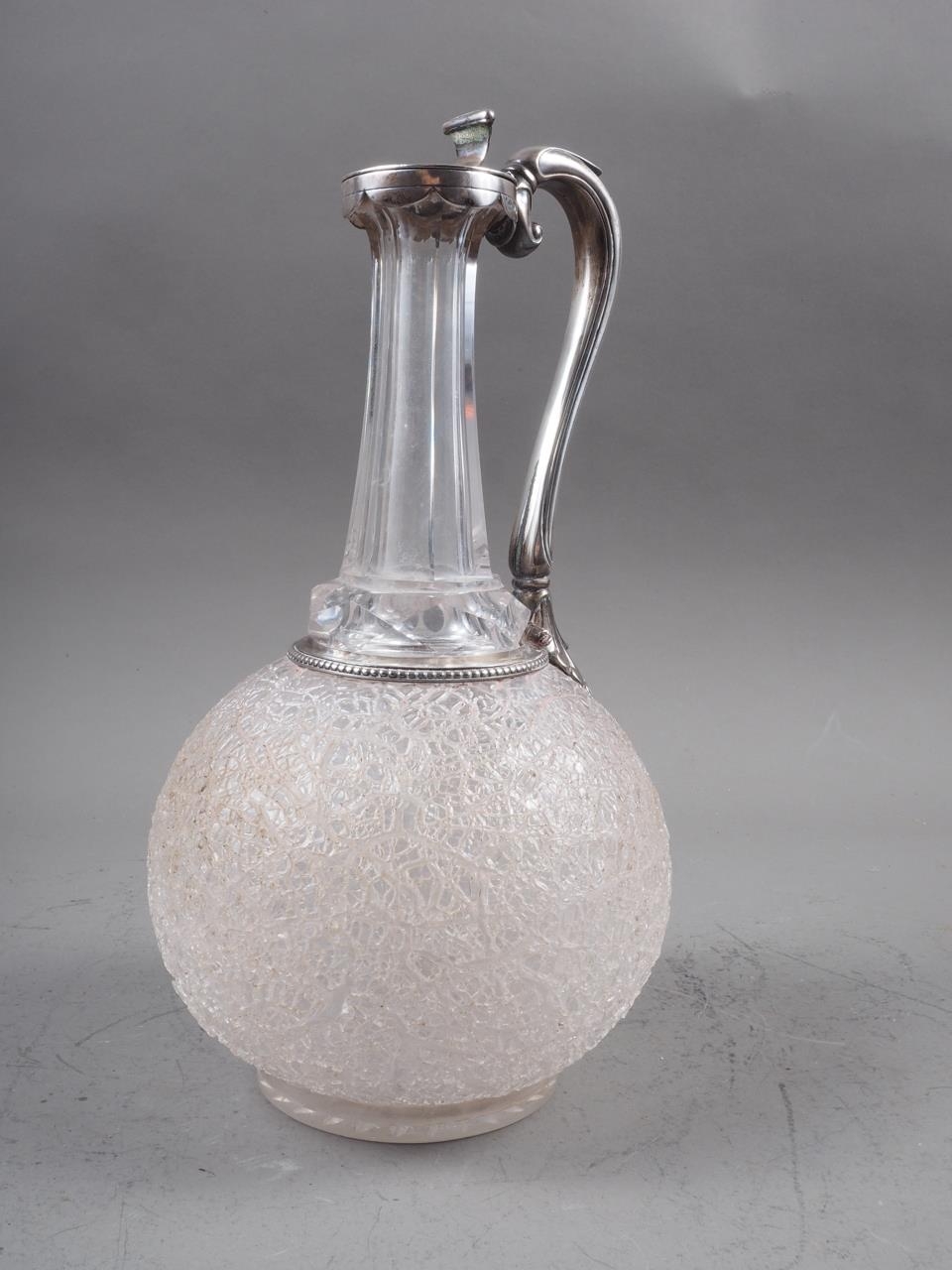 A 19th century silver mounted cut and crushed ice glass decanter, 10" high