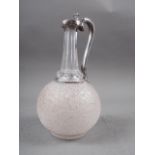 A 19th century silver mounted cut and crushed ice glass decanter, 10" high