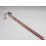 A church brass snuffer, 31 1/2" high, and a brass and turned oak haberdashery hook?, 45 3/4" long