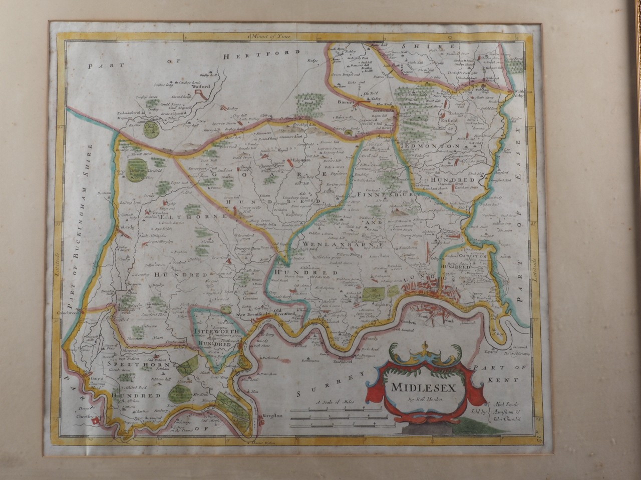 An 18th century hand-coloured map, Robert Morden's Middlesex, in ebonised frame