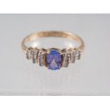 A 9ct gold, diamond and tanzanite dress ring, size S, 2.3g