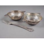 A pair of pierced silver sweetmeat dishes, a silver fork and a silver mustard spoon, 3.8oz troy