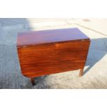 A 19th century mahogany Pembroke table, fitted one drawer with brass knob handle, on turned and