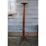 An Edwardian carved satinwood torchere of Adam design, on tripod splay support, 11" dia x 63" high