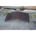 A cast iron fire grate, 29" wide x 15 1/2" deep x 7" high