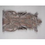 A Victorian carved oak wall plaque, 10 1/2" wide x 20 1/4" high