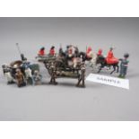 A quantity of early 20th century lead toy soldiers, including cavalry, band members and three