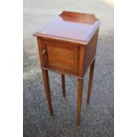A late Victorian walnut bedside cupboard, on square taper supports, 14" wide x 14" deep x 36" high