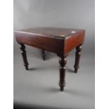 A late 19th century mahogany bidet stool, on turned supports, 21" wide x 13 1/2" deep x 17" high (no