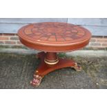 A mahogany circular "specimen" marquetry top occasional table, on turned column, triform base and