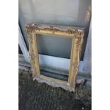 An ornate gilt picture frame, 31" x 23" overall