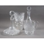 Two cut glass decanters and stoppers, a similar water jug and a vase