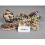 Sixteen Border Fine Art resin animal models, including "Family Life, Otter Family", some with