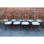A matched set of ten Windsor wheelback dining chairs