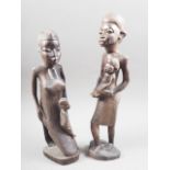 Two African carved ebony figures of women, taller 14" high