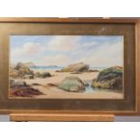 W S Tomkin: watercolours, rocky shore, 7 3/4" x 13 1/2", in gilt strip frame